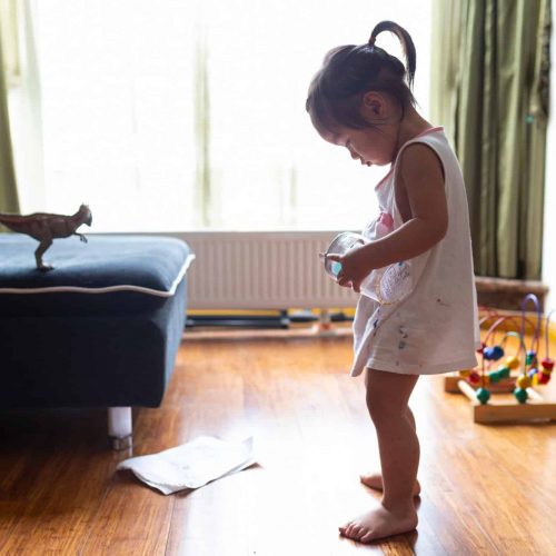 young child participating in early intervention therapy